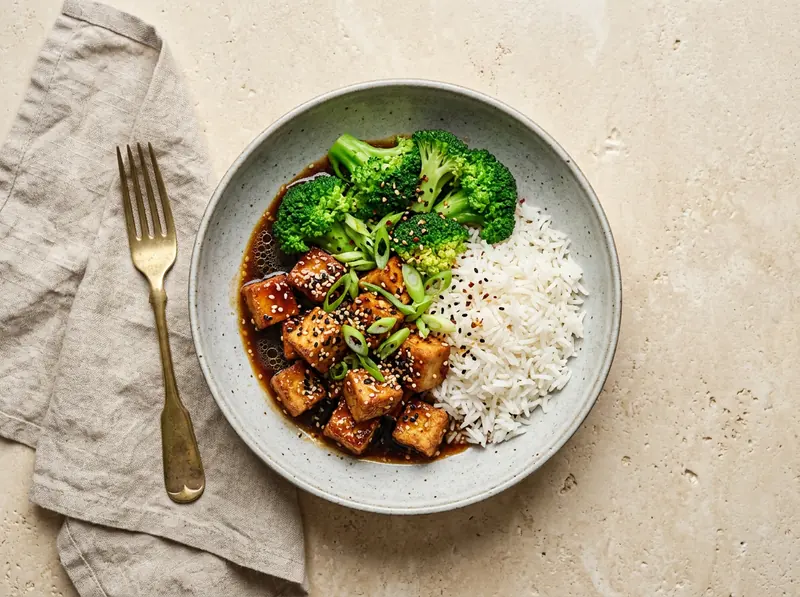 Sticky sesame tofu with greens